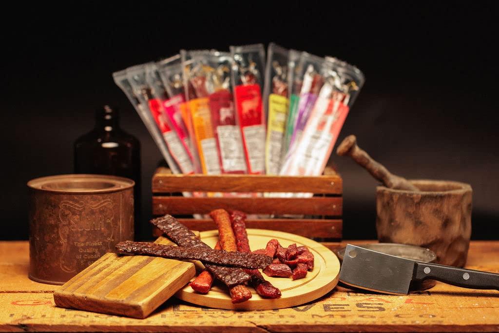 image:imageJerkycom Exotic Meat Sticks Gift Bag Wild Game Jerky Sampler with Venison Elk amp Wild Boar 12pc High Protein Jerky Gift basket Unique Birthday Gifts for Men12 Piece Gift Bag