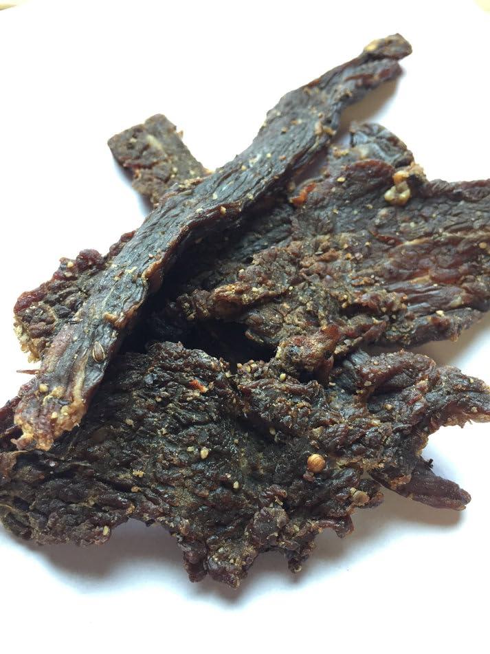 image:imageJerkycom All Natural Chipotle Bourbon Beef Jerky No Added Preservatives No MSG or Nitrates Smoky BourbonInfused Heat 100 Lean Beef 25 Ounce Pack of 1Montreal Style