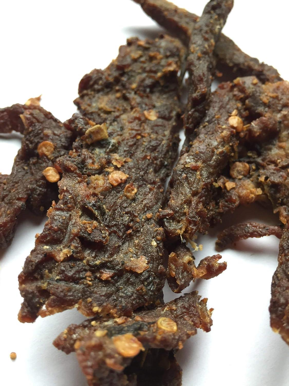 image:imageJerkycom All Natural Chipotle Bourbon Beef Jerky No Added Preservatives No MSG or Nitrates Smoky BourbonInfused Heat 100 Lean Beef 25 Ounce Pack of 1Green Chile