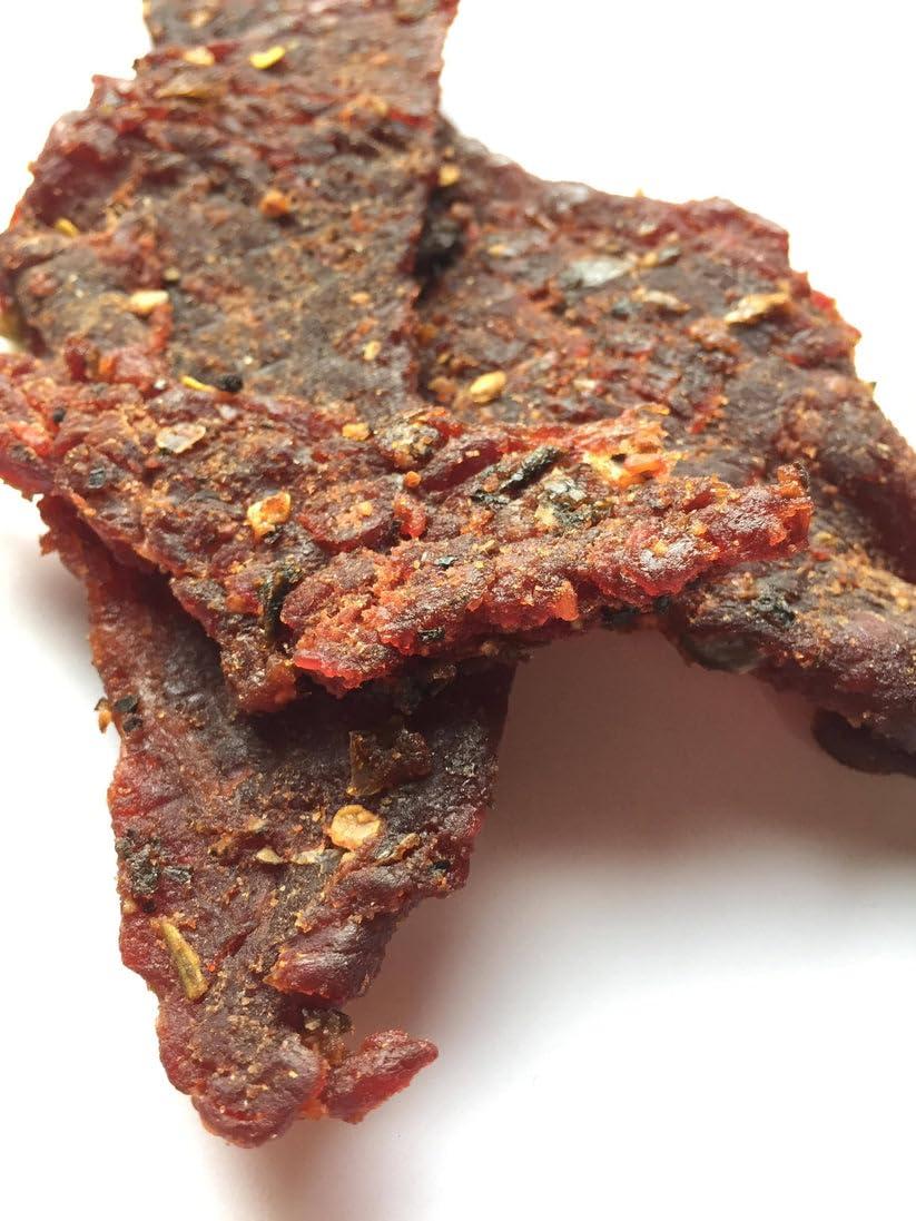 image:imageJerkycom All Natural Chipotle Bourbon Beef Jerky No Added Preservatives No MSG or Nitrates Smoky BourbonInfused Heat 100 Lean Beef 25 Ounce Pack of 1Jalapeno Garlic