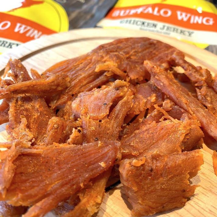 image:imageJamaican Jerk All Natural Chicken Jerky The Best Chicken Jerky on the Market 100 Whole Muscle Chicken No Added Preservatives No Added Nitrates and No Added MSG 25 oz bagBuffalo Wing